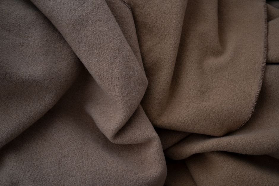 How to Fold a Fleece Jacket? — Step 2: Arrange the Sleeves